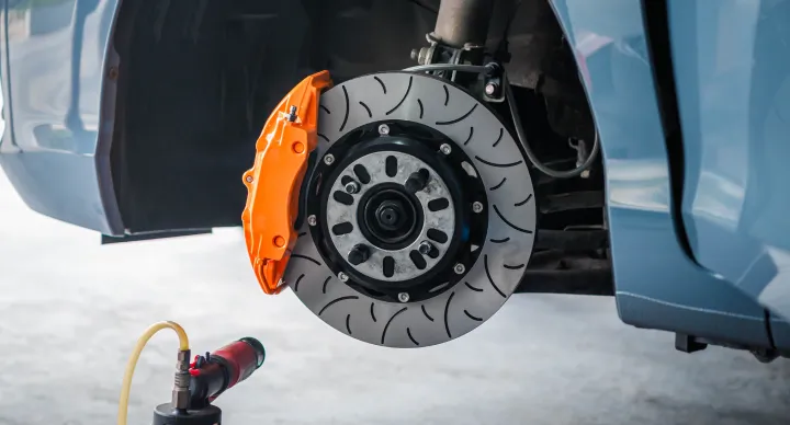 Brake Repair In Grand Blanc Township, MI At Grand Pointe Automotive. Close-up of a brake assembly