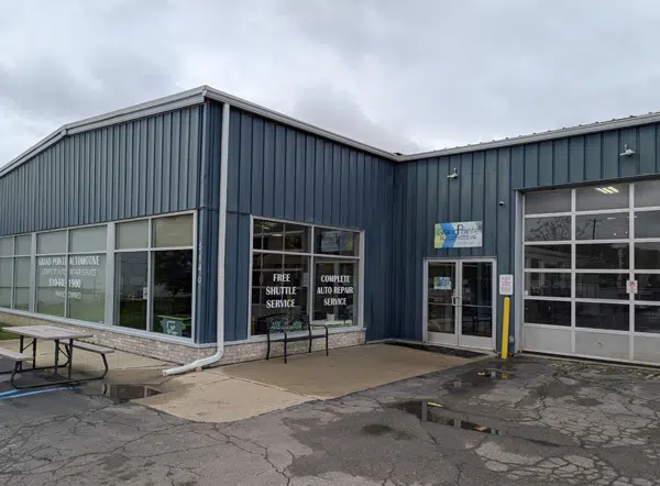 Blue building with service signs outside
