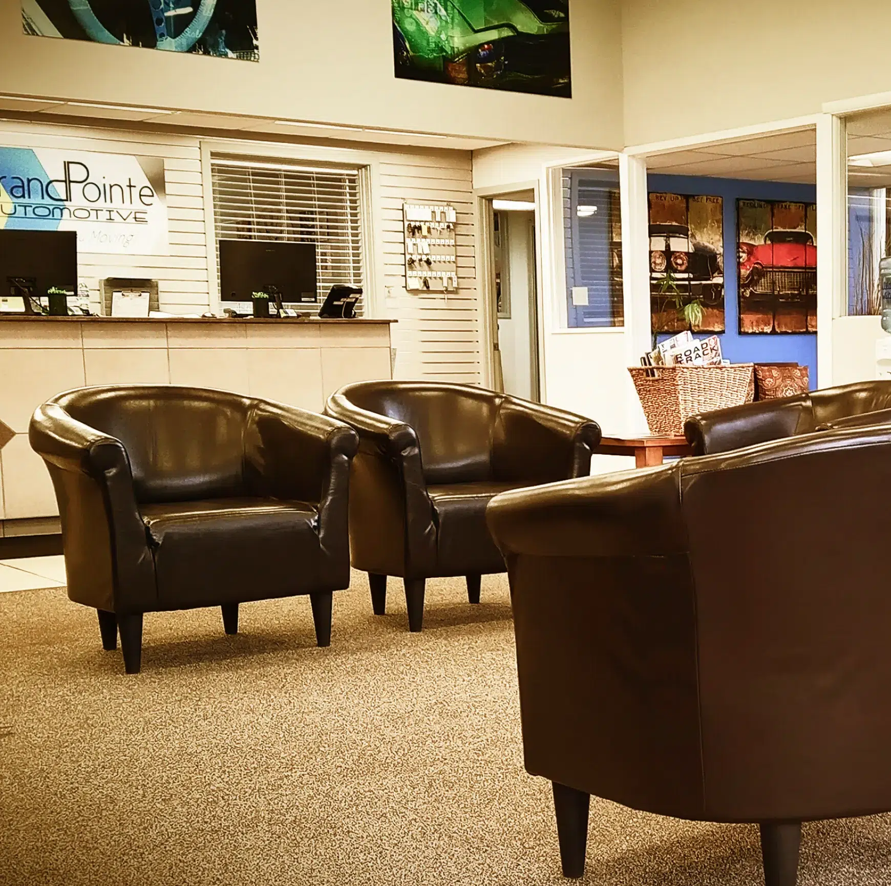 Cozy waiting area with leather chairs.